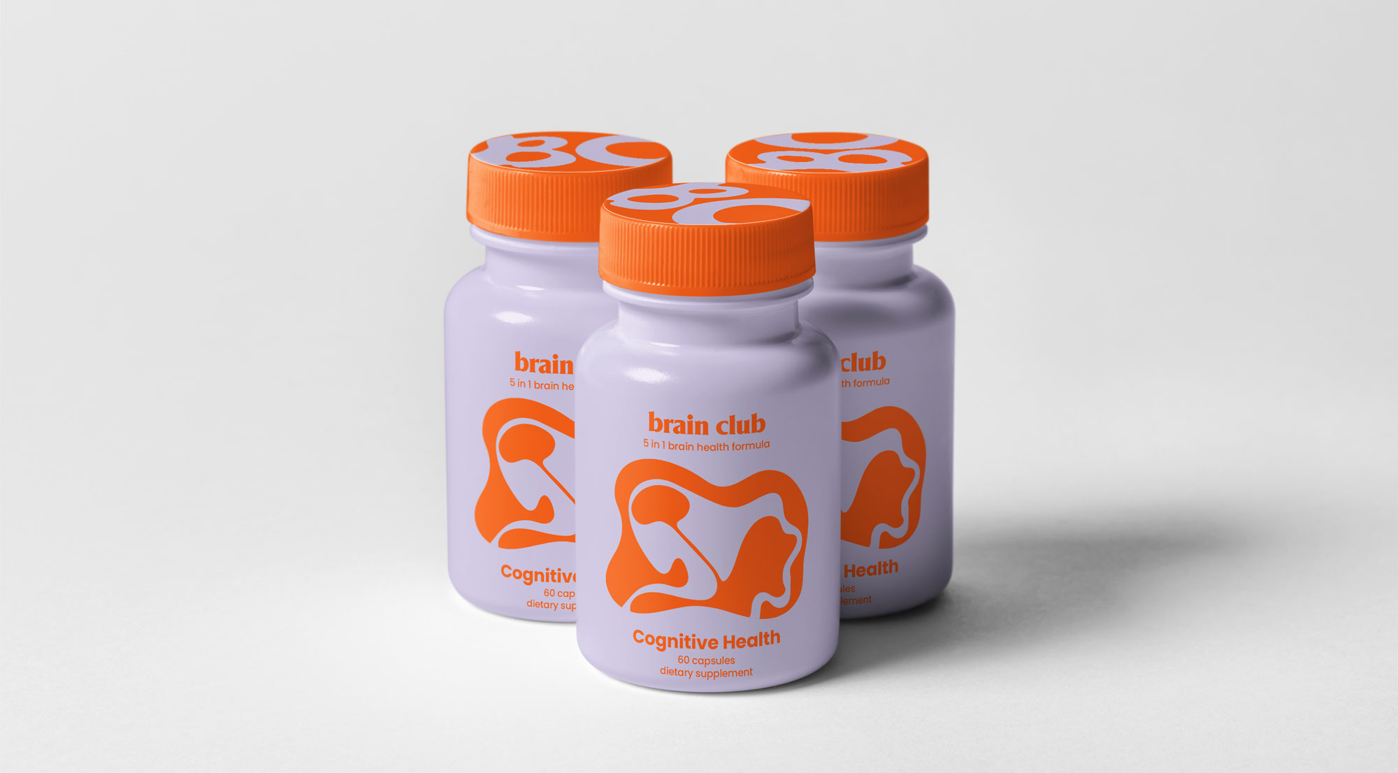 three supplement bottles with purple and orange design